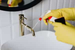 Professional cleaner from Shine This wiping kitchen counters in a Portland Oregon home